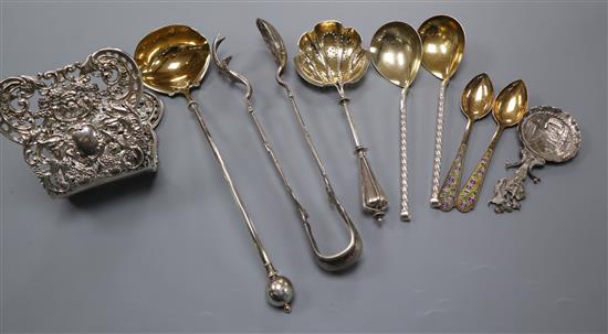 A Victorian repousse silver desk clip? and a small group of flatware including sterling, Russian white metal and plated.
